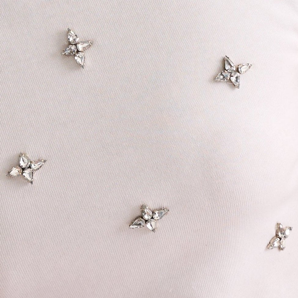 Leaf-shaped rhinestones on a tee, on the Halo top